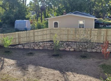 Photo of a retaining wall and a fence project in Kalamazoo, Michigan