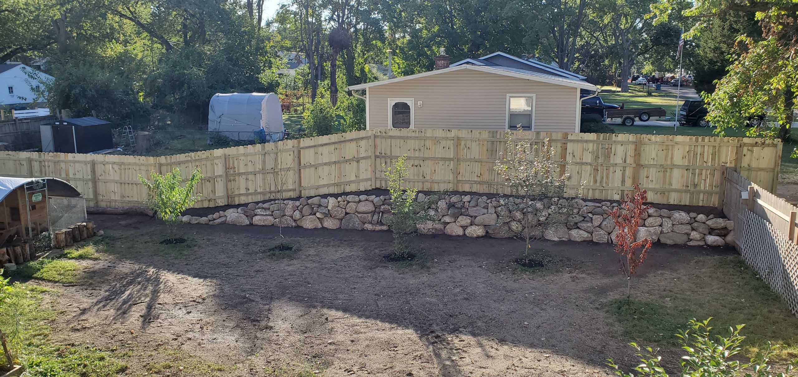 Photo of a retaining wall and a fence project in Kalamazoo, Michigan